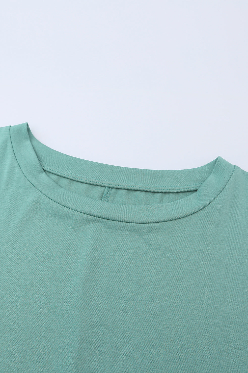 Tunique à manches courtes avec poches latérales 