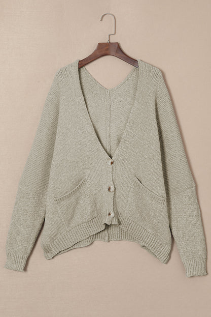 Cardigan gris à poches sur le devant et boutons 