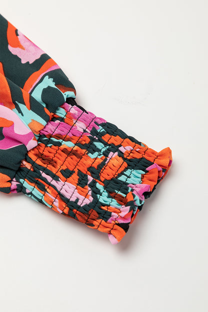 Robe courte rouge à fleurs et manches évasées à pompons