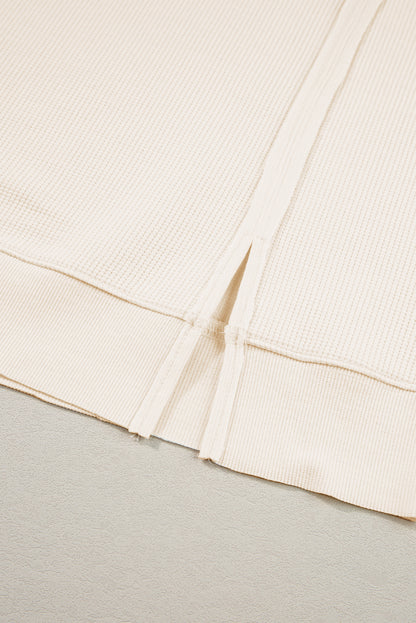 Sweat-shirt surdimensionné fendu à manches évasées en tricot gaufré blanc