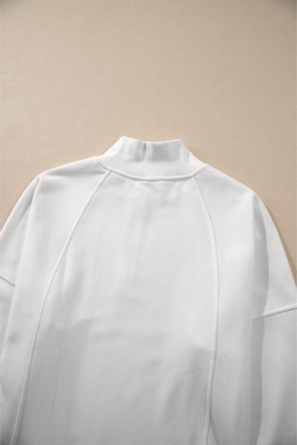 Sweat-shirt blanc à col zippé et épaules tombantes