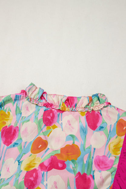 Chemisier rose à volants superposés et col en V avec manches flottantes