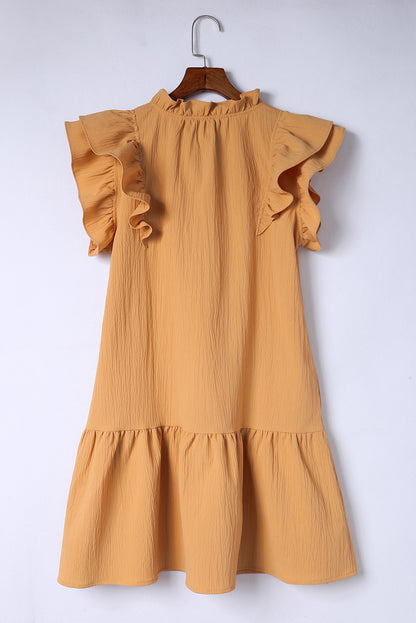 Mini-robe à volants et manches à volants avec poches