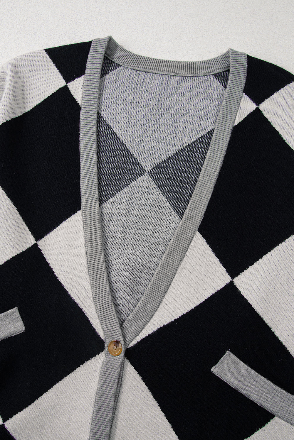 Cardigan ample boutonné à épaules tombantes et colorblock noir