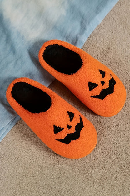 Chaussons en peluche orange à motif citrouille d'Halloween