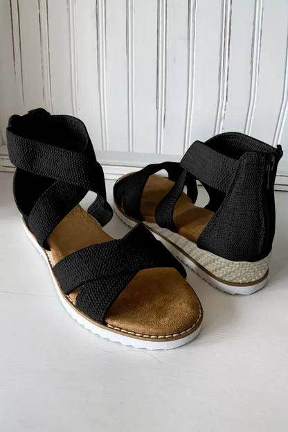 Sandalias de cuña baja con cremallera y tiras cruzadas en beige