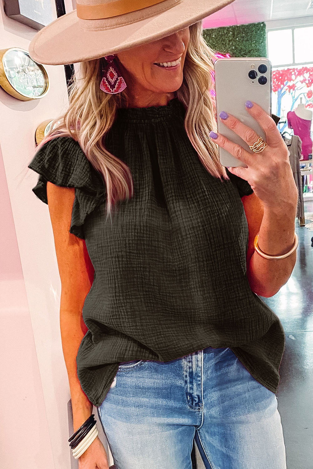 Chemisier texturé à manches flottantes et col à volants 