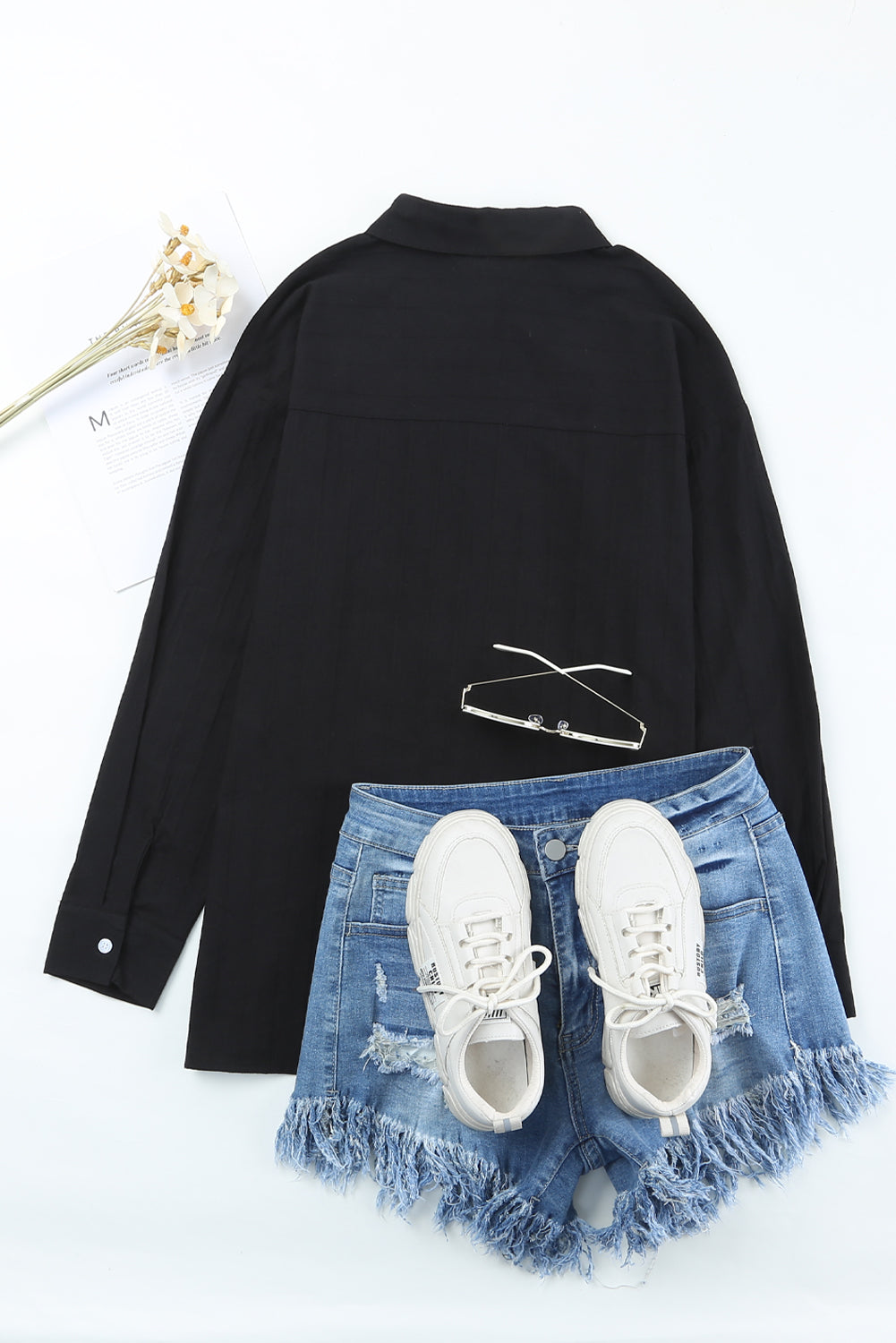 Camisa con botones texturizados y bolsillos