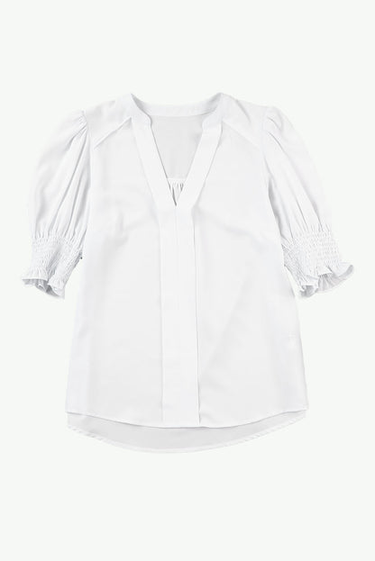 Blusa con cuello en V y media manga de color liso