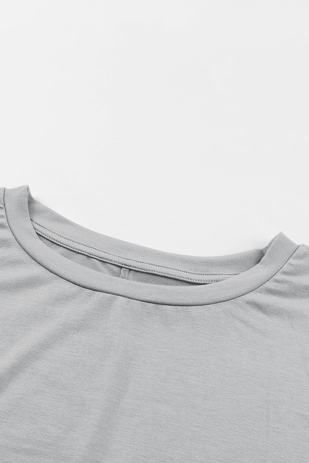 Tunique à manches courtes avec poches latérales 