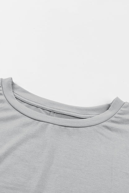 Tunique à manches courtes avec poches latérales 