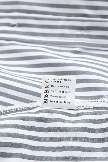 Camisa de manga larga con botones y bolsillos a rayas