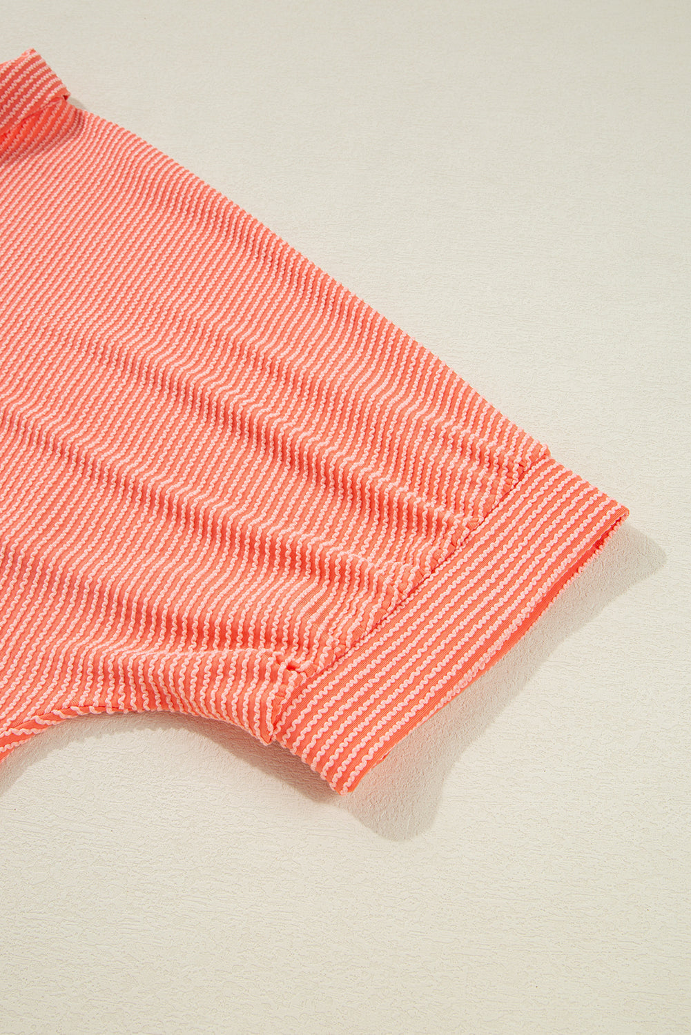 Chemise ample à manches mi-longues et ourlet haut-bas boutonné, couleur pamplemousse orange