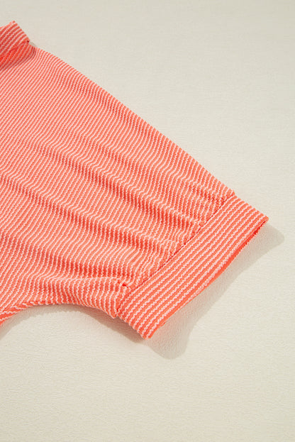 Chemise ample à manches mi-longues et ourlet haut-bas boutonné, couleur pamplemousse orange