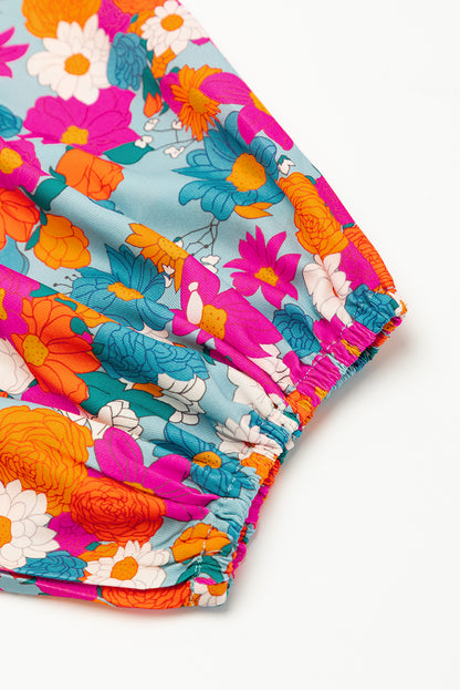 Robe babydoll bleu ciel à imprimé floral, col fendu, manches bouffantes