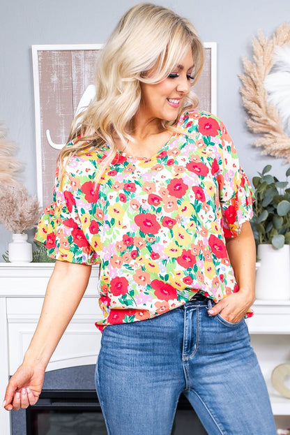 Blusa con cuello en V y manga corta con volantes y estampado floral 