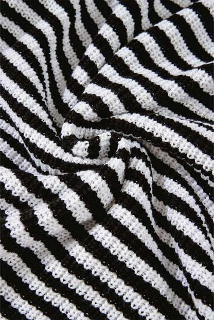 Pull à rayures noires, col zippé, épaules tombantes