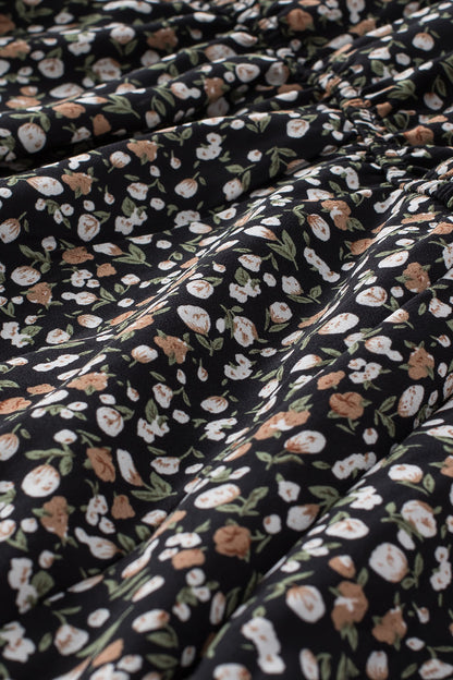 Blusa de manga larga con volantes y lazo delantero con estampado floral