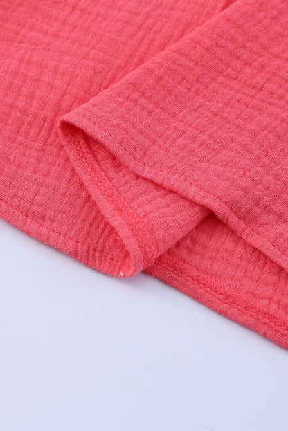 Chemisier texturé à manches flottantes et col à volants 