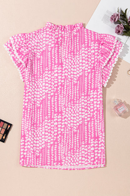 Chemisier rose à imprimé abstrait et bordure Ric Rac, manches flottantes, col en V cranté