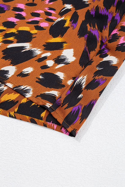 Chemisier orange à imprimé léopard, drapé, manches courtes, col en V fendu