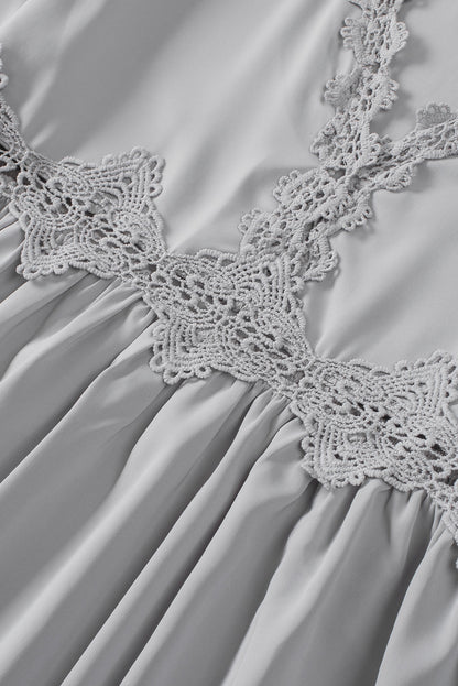 Chemisier à manches cloche et empiècements en crochet