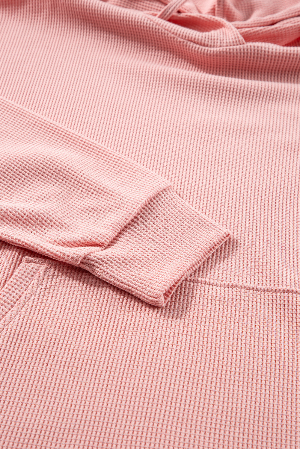 Sweat à capuche surdimensionné rose clair en tricot gaufré doublé polaire à col montant