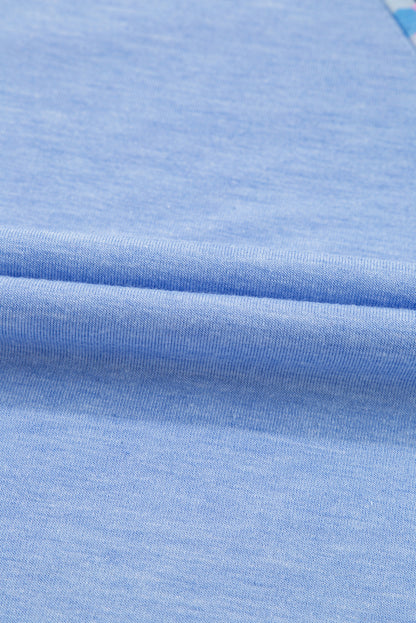 T-shirt grande taille bleu ciel à imprimé léopard et patch colorblock