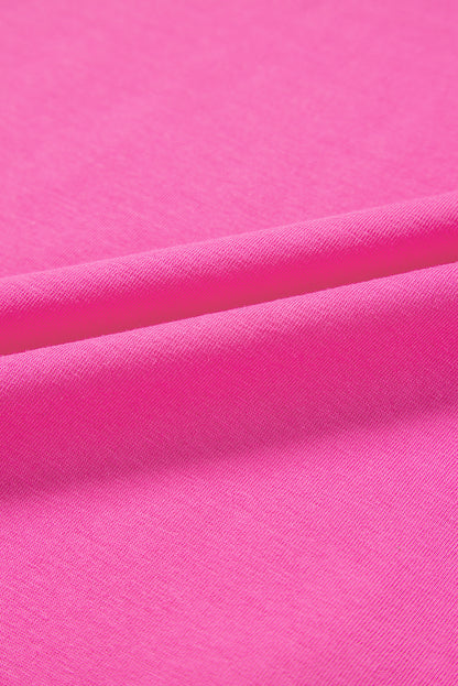 Haut rose à manches courtes et col fendu avec bordure contrastante, grande taille