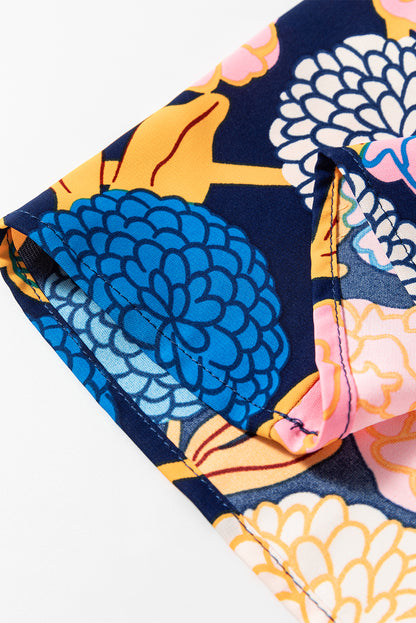 Robe droite bleu marine à imprimé floral d'hortensias, manches bouffantes, col en V