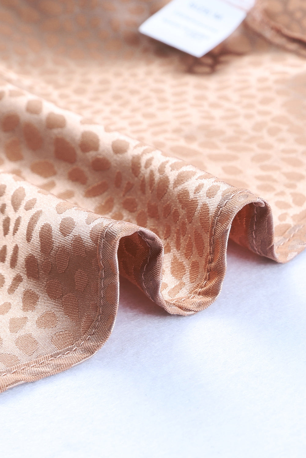 Débardeur léopard sans manches à col montant et lien 