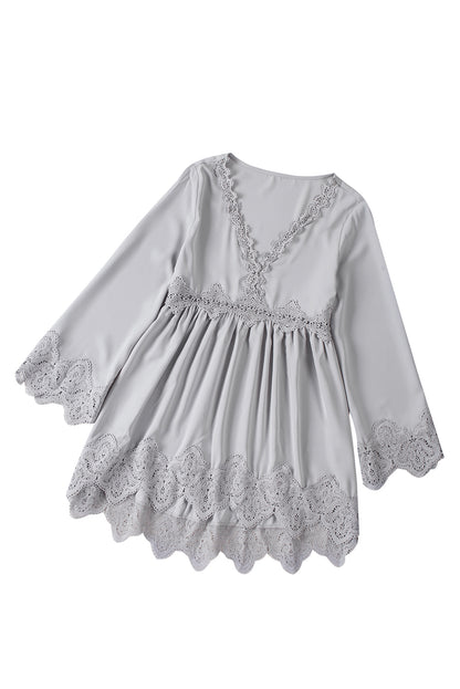 Chemisier à manches cloche et empiècements en crochet