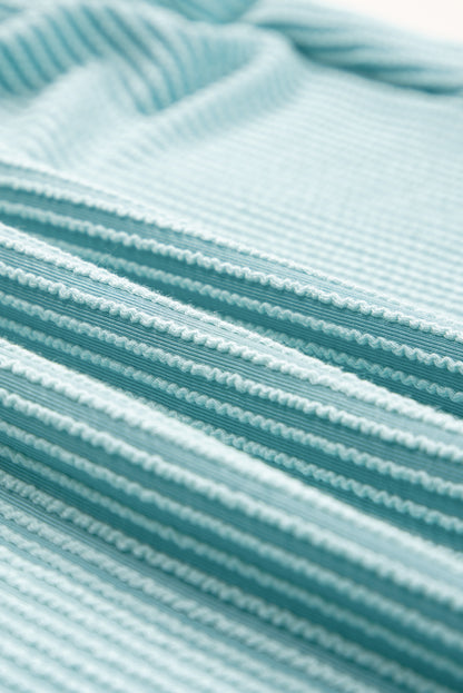 Débardeur texturé vert menthe à boutons et col en V contrasté