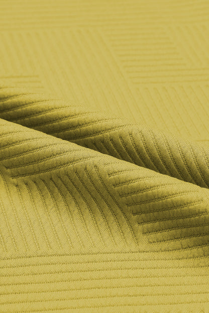 Conjunto de camiseta holgada con textura gris y pantalón con cordón