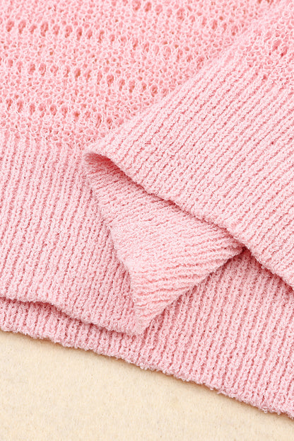 Haut tricoté à manches longues et col rond avec œillets 