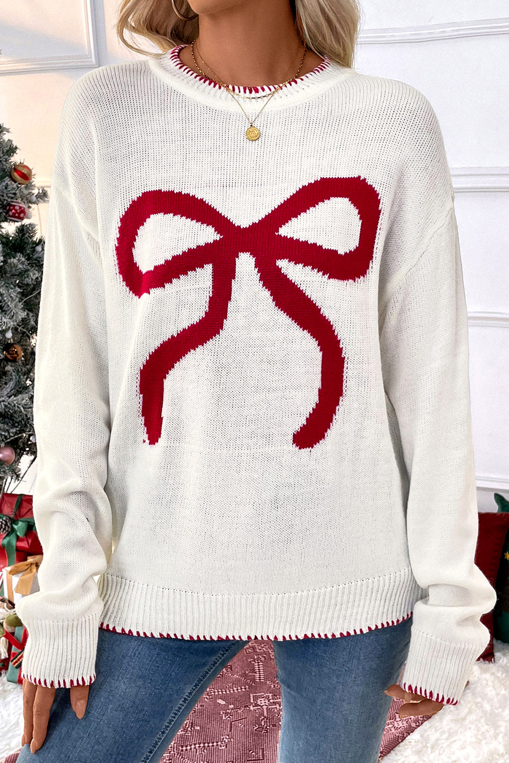 Pull graphique ample de Noël à motif de nœud blanc et bordure contrastée