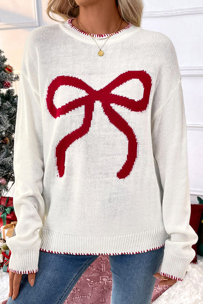 Pull graphique ample de Noël à motif de nœud blanc et bordure contrastée