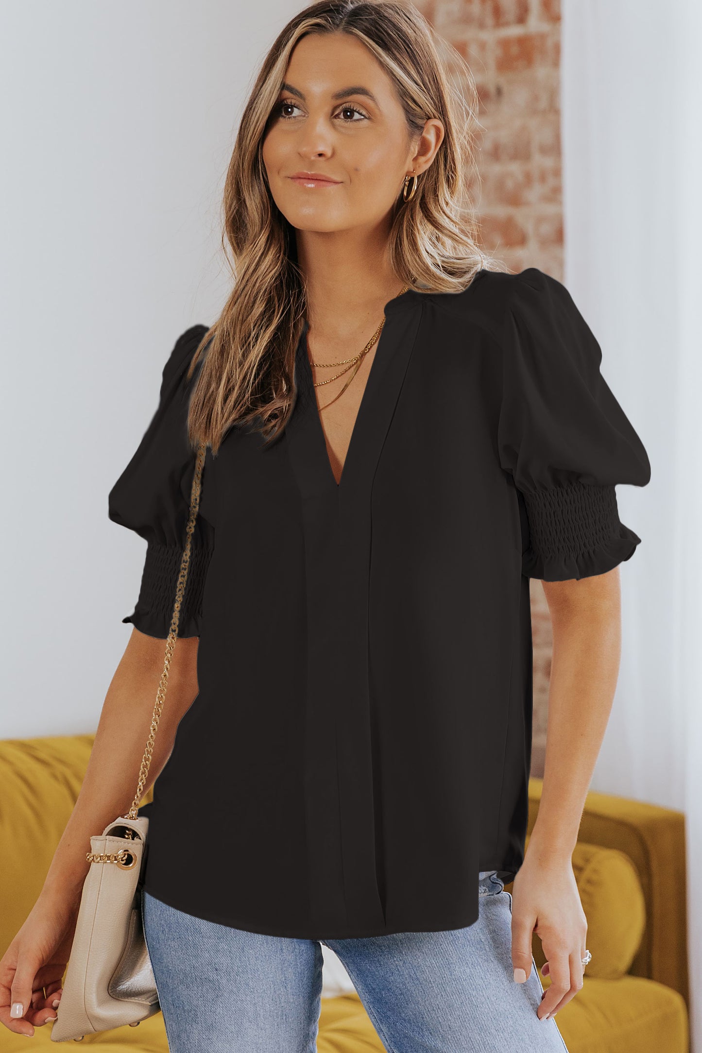 Blusa con cuello en V y media manga de color liso