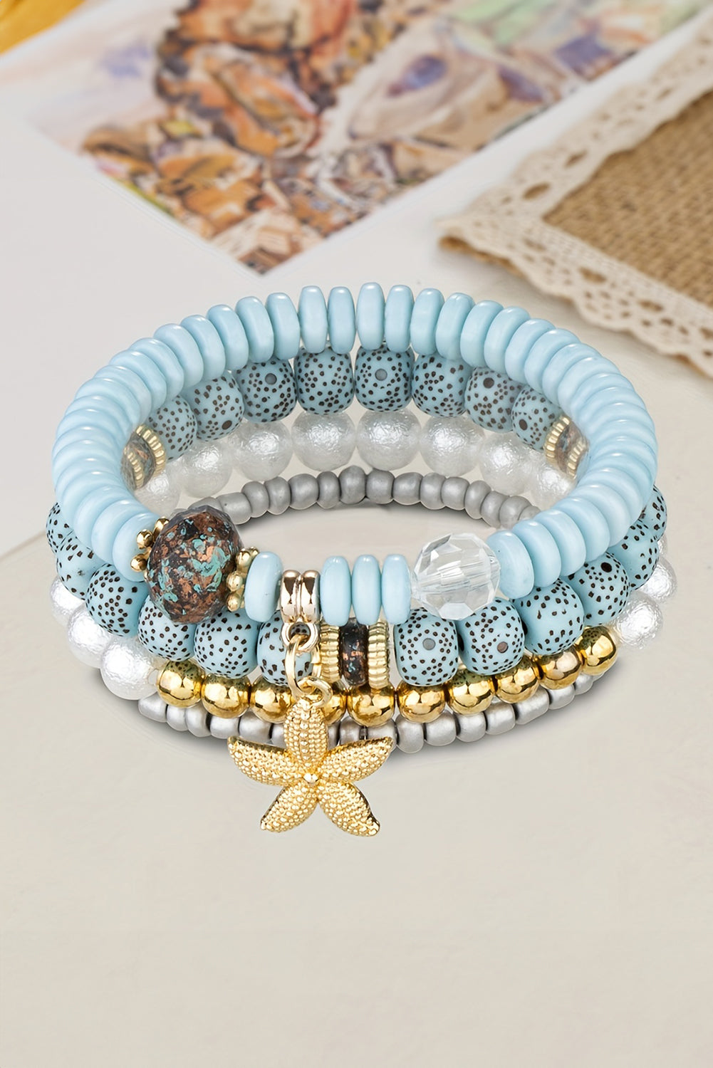 Ensemble de 4 bracelets de perles avec pendentif étoile de mer bleu clair