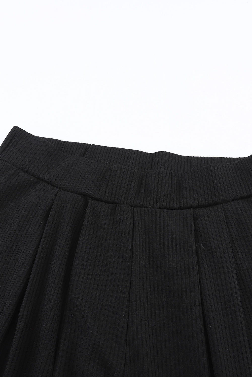 Ensemble haut court côtelé et pantalon long de couleur unie 