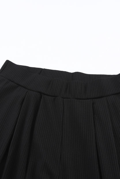 Ensemble haut court côtelé et pantalon long de couleur unie 