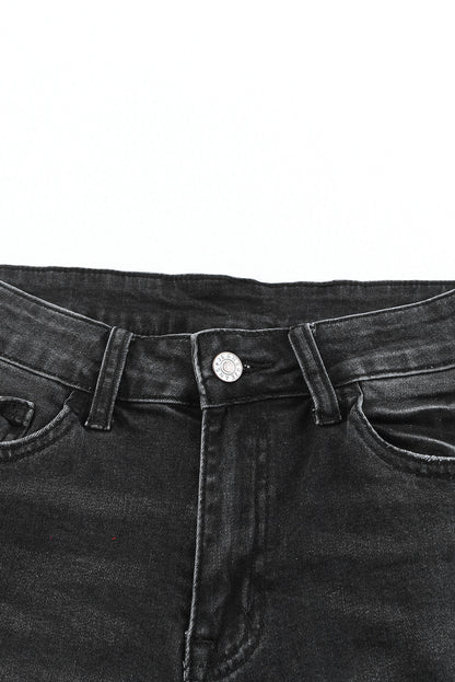 Short bermuda en jean effet vieilli et retroussé 
