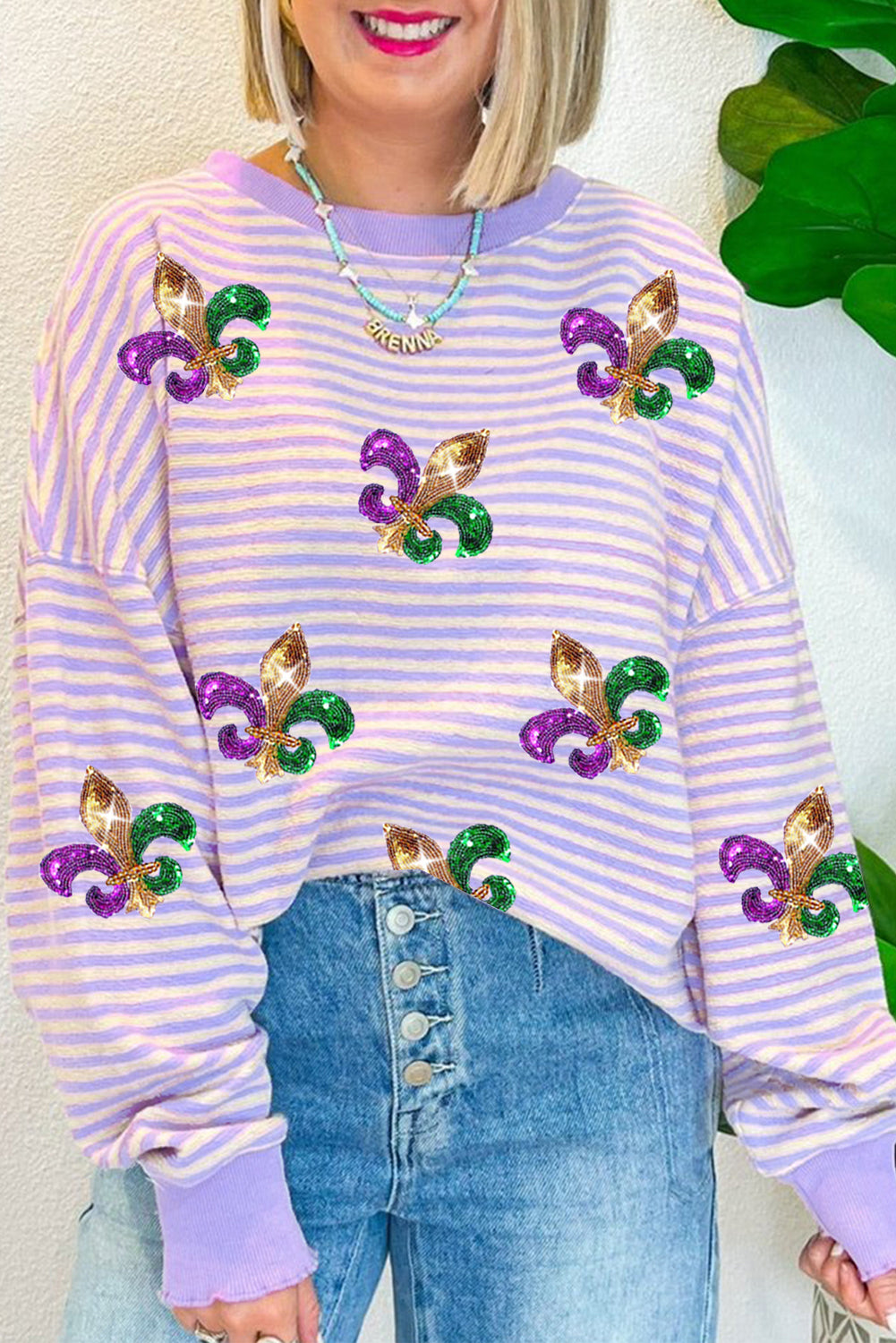 Haut à manches longues à rayures violettes et sequins, motif patché fleur de lys