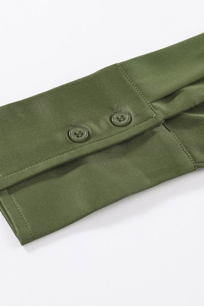 Blusa elegante de manga larga con cuello vuelto negro