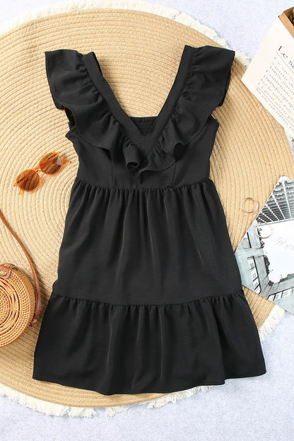 Mini-robe à volants, col en V et dos froncé