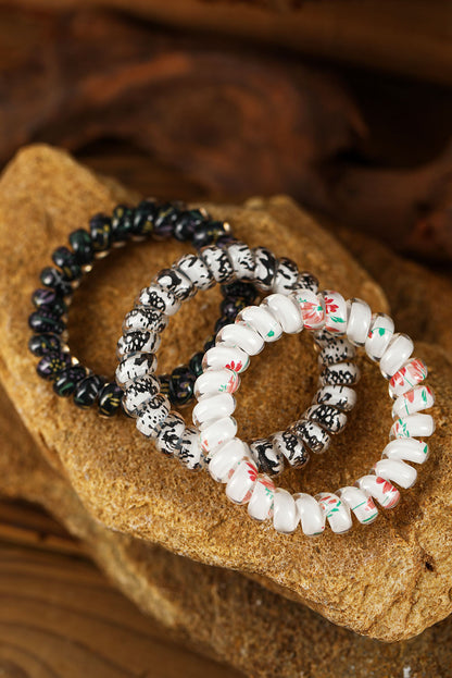 Coletero con cordón para teléfono floral negro