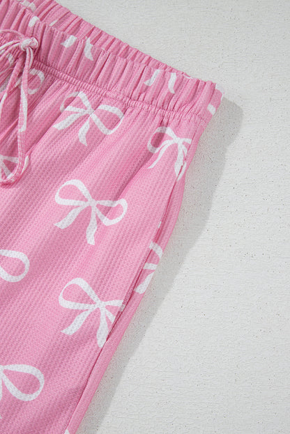 Ensemble t-shirt col V et short en tricot gaufré rose imprimé nœud papillon