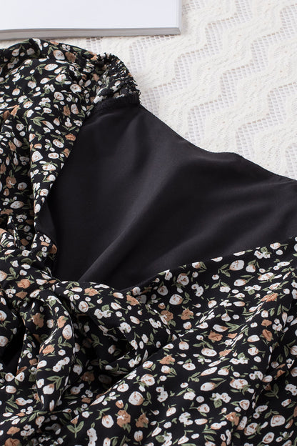 Blusa de manga larga con volantes y lazo delantero con estampado floral