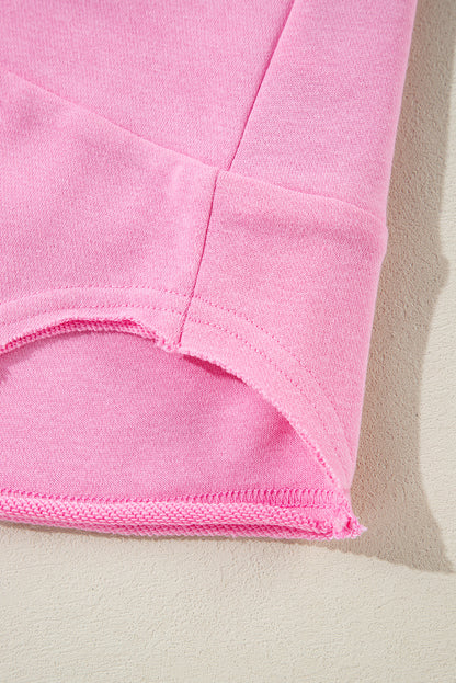 Sweat-shirt ample rose uni à encolure boutonnée