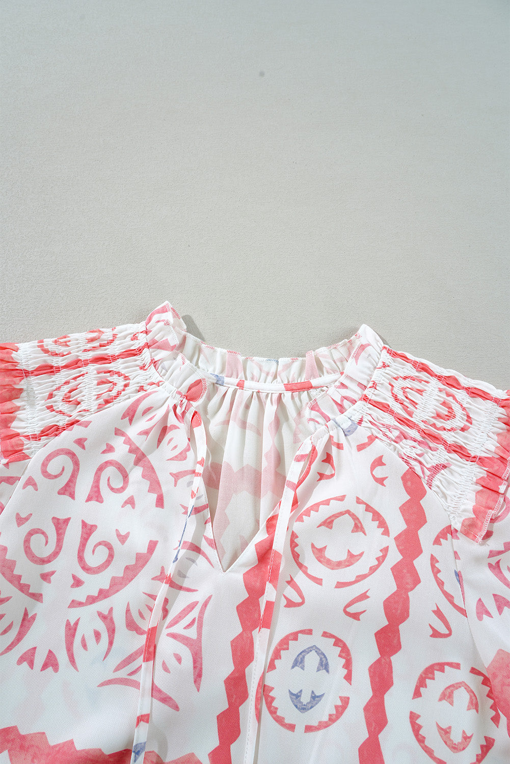 Chemisier à manches bouffantes et col poète smocké imprimé vintage fleur du désert